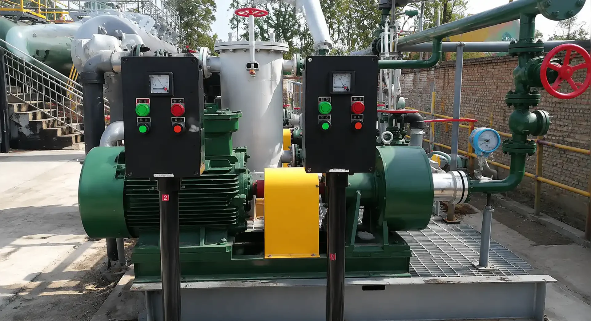 Refinery pump installation with process piping valves and steel structures